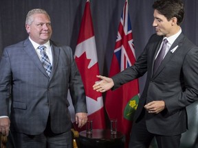 Prime Minister Justin Trudeau meets with Ontario Premier Doug Ford in Montreal on Dec. 6, 2018. (The Canadian Press)