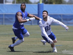 Defensive back Marcus Rios (25) covers wide receiver Drew Morgan (81) during the Winnipeg Blue Bombers mini-camp at IMG Academy in Bradenton Florida on Wednesday, April 24, 2019. Photo by Tom O'Neill