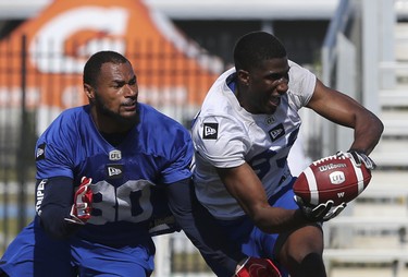 Winnipeg Blue Bombers defensive back Joe Este (30) defends wide receiver Josh Stewart (83) during a team mini-camp at IMG Academy in Bradenton Florida on Wednesday, April 24, 2019.

Photo by Tom O'Neill