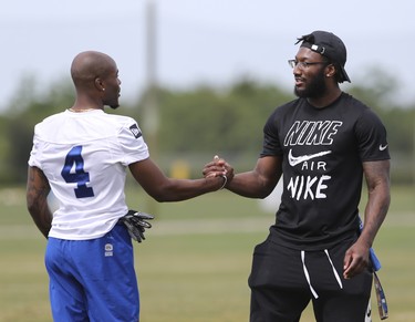 Winnipeg Blue Bombers wide receiver Garret Johnson (4) greets defensive back Brandon Alexander at a team mini- camp at IMG Academy in Bradenton Florida on Thursday, April 25, 2019.

Photo by Tom O'Neill