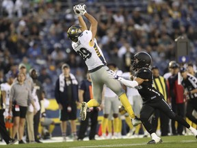 In this March 17, 2019, file photo, San Diego Fleet tight end Gavin Escobar (89) makes a critical first down catch on fourth and long over Birmingham Iron defensive back Max Redfield (20) late in the second half of an Alliance of American Football game in San Diego. (AP Photo/Peter Joneleit, File)