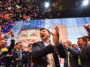 Ukrainian comedian and presidential candidate Volodymyr Zelensky reacts after the announcement of the first exit poll results in the second round of Ukraine's presidential election at his campaign headquarters in Kiev on April 21, 2019.