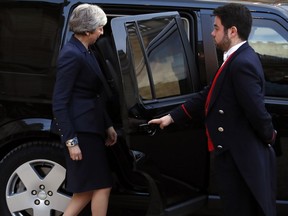 British Prime Minister Theresa May leaves after a meeting with French President Emmanuel Macron at the Elysee Palace in Paris Tuesday, April 9, 2019.