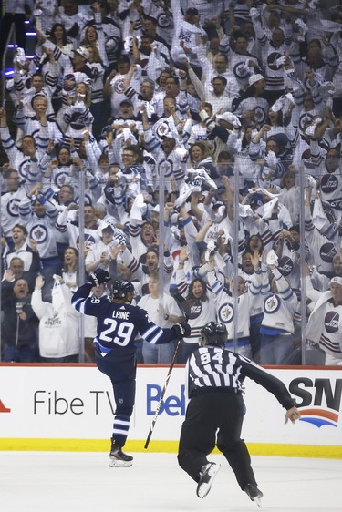 Winnipeg Jets right wing Patrik Laine (29) celebrates scoring against the St. Louis Blues during first period NHL playoff action in Winnipeg on Wednesday, April 10, 2019. THE CANADIAN PRESS/John Woods