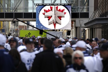 Fans gather for the Winnipeg Jets White Out Party prior to first round NHL playoffs action between the Jets and St. Louis Blues in Winnipeg on Wednesday, April 10, 2019. THE CANADIAN PRESS/John Woods