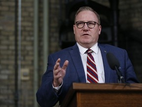 Manitoba Finance Minister Scott Fielding speaks at a press conference in Winnipeg on March 15, 2019. The Manitoba government is now raising the idea that stalling tactics by the opposition in the legislature could threaten a provincial sales tax cut set to take effect July 1. The idea, put forward by Finance Minister Scott Fielding, is a marked departure from comments last month by Premier Brian Pallister, who said the cut will occur even if the bill enacting the tax cut is still before the legislature.