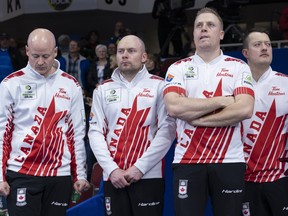 Canada skip Kevin Koe, third B.J. Neufeld, second Colton Flasch, lead Ben Hebert, left to right, stand on the podium after losing to Sweden in the gold medal game at the Men's World Curling Championship in Lethbridge, Alta. on Sunday, April 7, 2019. THE CANADIAN PRESS/Paul Chiasson