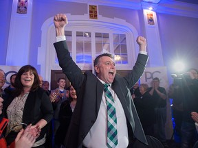 Progressive Conservative Leader Dennis King, accompanied by his wife Jana Hemphill, left, arrives to greet supporters after winning the Prince Edward Island provincial election in Charlottetown on Tuesday, April 23, 2019.