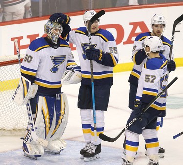 WINNIPEG, MANITOBA - APRIL 10: Colton Parayko #55 of the St. Louis Blues congratulates goalie Jordan Binnington #50 after defeating the Winnipeg Jets in Game One of the Western Conference First Round during the 2019 NHL Stanley Cup Playoffs at Bell MTS Place on April 10, 2019 in Winnipeg, Manitoba, Canada. (Photo by Jason Halstead/Getty Images)