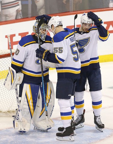 WINNIPEG, MANITOBA - APRIL 10: Colton Parayko #55 of the St. Louis Blues congratulates goalie Jordan Binnington #50 after defeating the Winnipeg Jets in Game One of the Western Conference First Round during the 2019 NHL Stanley Cup Playoffs at Bell MTS Place on April 10, 2019 in Winnipeg, Manitoba, Canada. (Photo by Jason Halstead/Getty Images)