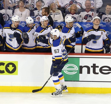 WINNIPEG, MANITOBA - APRIL 10: David Perron #57 of the St. Louis Blues celebrates his goal against the Winnipeg Jets in Game One of the Western Conference First Round during the 2019 NHL Stanley Cup Playoffs at Bell MTS Place on April 10, 2019 in Winnipeg, Manitoba, Canada. (Photo by Jason Halstead/Getty Images)