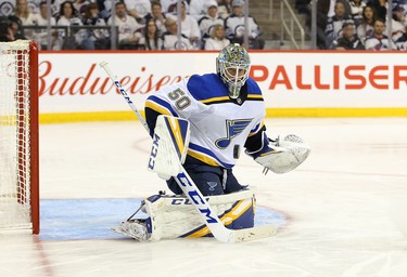 WINNIPEG, MANITOBA - APRIL 10: Jordan Binnington #50 of the St. Louis Blues makes a save against the Winnipeg Jets in Game One of the Western Conference First Round during the 2019 NHL Stanley Cup Playoffs at Bell MTS Place on April 10, 2019 in Winnipeg, Manitoba, Canada. (Photo by Jason Halstead/Getty Images)