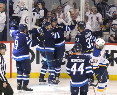 WINNIPEG, MANITOBA - APRIL 10: Patrik Laine #29 of the Winnipeg Jets celebrates his goal in Game One of the Western Conference First Round against the St. Louis Blues during the 2019 NHL Stanley Cup Playoffs at Bell MTS Place on April 10, 2019 in Winnipeg, Manitoba, Canada. (Photo by Jason Halstead/Getty Images)