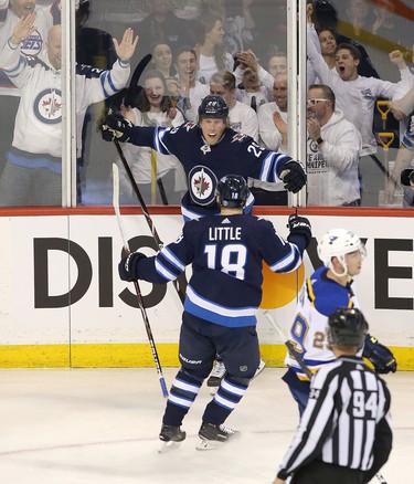 WINNIPEG, MANITOBA - APRIL 10: Patrik Laine #29 of the Winnipeg Jets celebrates his goal in Game One of the Western Conference First Round against the St. Louis Blues during the 2019 NHL Stanley Cup Playoffs at Bell MTS Place on April 10, 2019 in Winnipeg, Manitoba, Canada. (Photo by Jason Halstead/Getty Images)