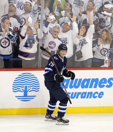 WINNIPEG, MANITOBA - APRIL 10: Patrik Laine #29 of the Winnipeg Jets celebrates his goal against the St. Louis Blues in Game One of the Western Conference First Round during the 2019 NHL Stanley Cup Playoffs at Bell MTS Place on April 10, 2019 in Winnipeg, Manitoba, Canada. (Photo by Jason Halstead/Getty Images) *** Patrik Laine