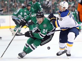 Roope Hintz of the Dallas Stars skates with the puck as St. Louis Blues defenceman Jay Bouwmeester defends at American Airlines Center on April 29, 2019 in Dallas. (Ronald Martinez/Getty Images)