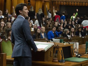 Canadian Prime Minister Justin Trudeau looks to the audience for a question following his speech to Daughters of the Vote in the House of Commons on Parliament Hill in Ottawa, Wednesday April 3, 2019. THE CANADIAN PRESS/Adrian Wyld ORG XMIT: ajw118