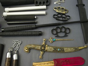 Items, prohibited on passenger airlines, and confiscated from passengers by Transportation Security Administration (TSA) officers, is displayed at Dulles International Airport in Dulles, Va., Tuesday, March 26, 2019.