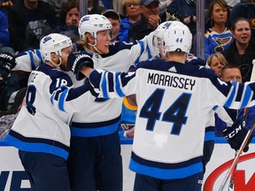 Patrik Laine #29 of the Winnipeg Jets celebrates after scoring a goal against the St. Louis Blues in Game Three of the Western Conference First Round during the 2019 NHL Stanley Cup Playoffs on Sunday in St. Louis.