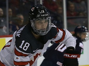 Canada defence Halli Krzyzaniak carries the puck during a pre-Olympic series exhibition game against the United States in Winnipeg on Tues., Dec. 5, 2017. Kevin King/Winnipeg Sun/Postmedia Network