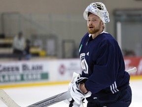 Winnipeg Jets have re-signed backup goalie Laurent Brossoit.