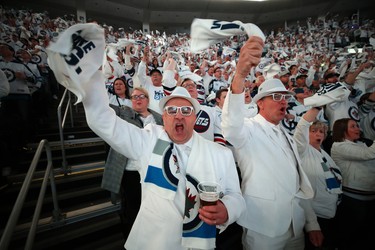 Fans cheer as the Winnipeg Jets take the ice for Game 1 of Round 1 of the NHL playoffs against the St. Louis Blues in Winnipeg on Wed., April 10, 2019. Kevin King/Winnipeg Sun/Postmedia Network