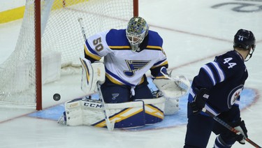 St. Louis Blues goaltender Jordan Binnington makes a save during Game 1 of Round 1 of the NHL playoffs against the Jets in Winnipeg on Wed., April 10, 2019. Kevin King/Winnipeg Sun/Postmedia Network