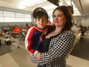 Ryder Robinson, blood recipient with his mother Christine Guyader. Winnipeg's baseball team is urging people to give blood to help people like Ryder.