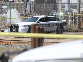 Winnipeg police investigate the city's 13th homicide of 2019 near train tracks in the 1000 block of Selkirk Ave. on Thursday, April 18. A 16-year-old boy faces second degree murder charges in the shooting death of 53-year-old Joselito Fernandez.