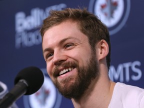 Josh Morrissey laughs while addressing media as the Winnipeg Jets cleaned out their lockers at Bell MTS Place in Winnipeg on Mon., April 22, 2019. Kevin King/Winnipeg Sun/Postmedia Network