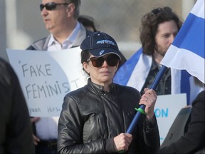 A small number of individuals gathered in Winnipeg to protest against human rights activist Linda Sarsour.  One male demonstrator held a sign that read "Fake Feminist", other waved flags. Friday, April 26, 2019 Chris Procaylo/Winnipeg Sun/Postmedia Network