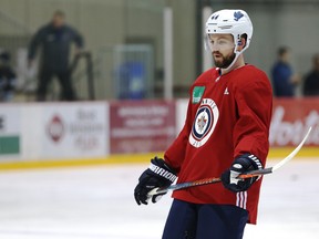 Josh Morrissey exhales during Winnipeg Jets practice at Bell MTS Iceplex on Mon., April 8, 2019. Kevin King/Winnipeg Sun/Postmedia Network