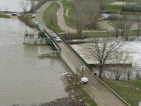 Flood waters from the Assiniboine River near Portage la Prairie enter the Portage diversion. May 11, 2011.