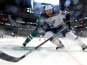 Stars’ Tyler Pitlick chases Blues’ Colton Parayko during Game 4 on Wednesday night in Dallas. (GETTY IMAGES)