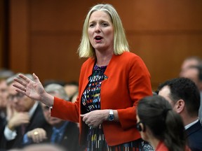 Minister of Environment and Climate Change Catherine McKenna rises during Question Period in the House of Commons on Parliament Hill in Ottawa on Thursday, May 16, 2019.