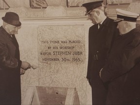 Poster board Images offer a glimpse of the 1965 ceremony to place a time capsule at Winnipeg's Public Safety Building. The images were displayed during an event to open and display the contents of that time capsule on Tuesday, May 21, 2019 at City Hall.  
JOYANNE PURSAGA/Winnipeg Sun/Postmedia Network