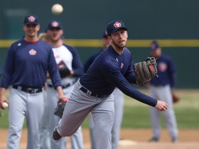 Infielder Wes Darvill throws during Goldeyes spring training camp at Shaw Park last month. The team spent the first seven games on the road in addition to five exhibition contests away from home during a 14-day trek. (KEVIN KING/WINNIPEG SUN)