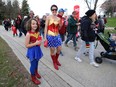 Rebecca Marrese, who has multiple sclerosis, and daughter Maya, 9, rock Wonder Woman outfits at the MS Walk at The Forks in Winnipeg on Sun., May 5, 2019. Kevin King/Winnipeg Sun/Postmedia Network
