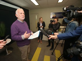 Dr. David Peachey talks to media in Winnipeg on Friday.