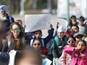 Young students attended a park near the Legislative Building in Winnipeg today, many had signs regarding water. Friday, May 10/2019 Winnipeg Sun/Chris Procaylo