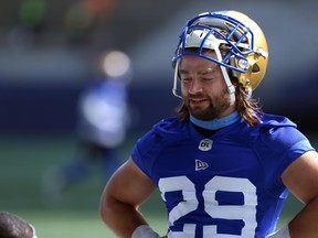 Jeff Hecht speaks with a teammate on the sideline during Winnipeg Blue Bombers training camp at IG Field on Tues., May 21, 2019. Kevin King/Winnipeg Sun/Postmedia Network