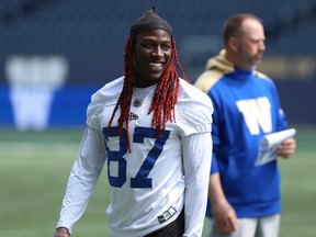 Receiver Lucky Whitehead smiles during the Winnipeg Blue Bombers walkthrough at IG Field.