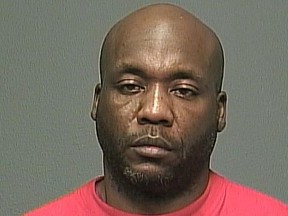 Perez Cleveland is seen in this undated police handout photo. A Crown prosecutor says a man on trial for first-degree murder maintained control over multiple women he lived with through surveillance, drugs and abuse. Perez Cleveland, 46, has pleaded not guilty in the death of Jennifer Barrett, 42, whose body was found in a barrel behind their Winnipeg home in December 2016.