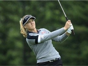 Brooke Henderson of Smiths Falls hits her second shot on the first hole during the final round of the Meijer LPGA Classic on Sunday.