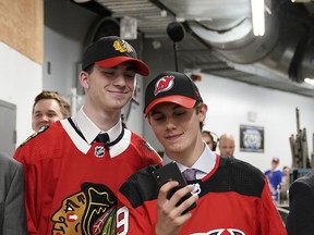 Jack Hughes takes a selfie after being selected first overall by the New Jersey Devils with Kirby Dach after being selected third overall by the Chicago Blackhawks during the first round of the 2019 NHL Draft at Rogers Arena on June 21, 2019 in Vancouver, Canada. (Photo by Rich Lam/Getty Images)