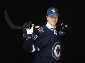 VANCOUVER, BRITISH COLUMBIA - JUNE 22: Simon Lundmark poses after being selected 51st overall by the Winnipeg Jets during the 2019 NHL Draft at Rogers Arena on June 22, 2019 in Vancouver, Canada. (Photo by Kevin Light/Getty Images)