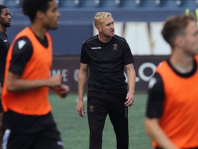 Head coach Rob Gale watches during Valour FC practice at IG Field on Wednesday. (KEVIN KING/Winnipeg Sun)