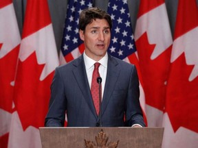 In this file photo taken on May 30, 2019 Canadian Prime Minister Justin Trudeau speaks during a joint press conference with the US Vice President in Ottawa, Ontario.
