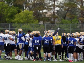 The Blue Bombers huddle during practice earlier this week. Winnipeg’s key pieces are returning from last season. (KEVIN KING/WINNIPEG SUN)
