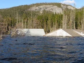 Flooded cabins are shown on Bottomless Pond near Deer Lake, N.L., in this undated handout photo.